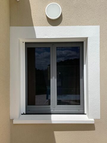 Moustiquaire de fenêtre à Corronsac