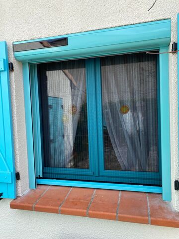 Pose de porte de garage enroulable motorisée